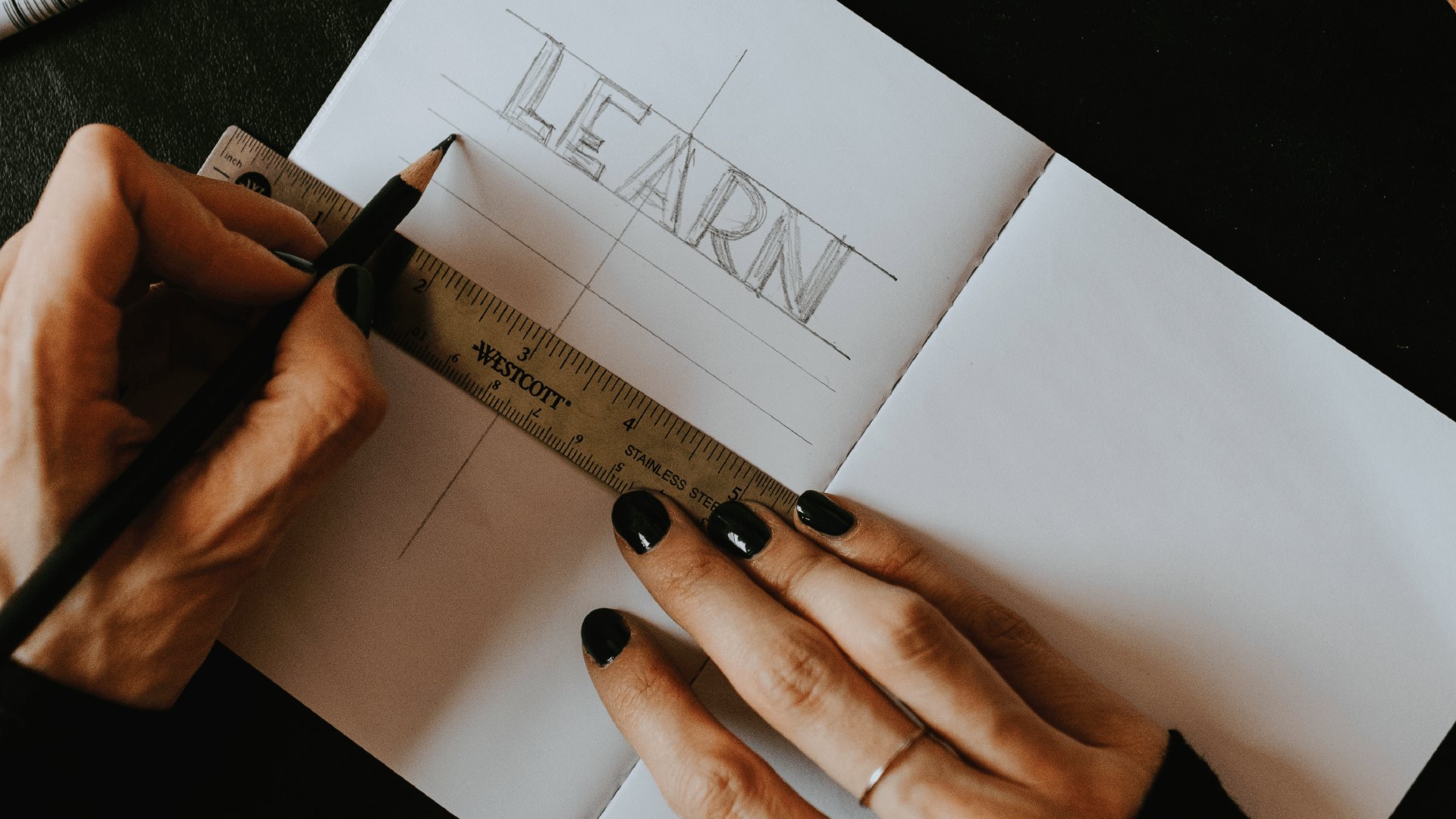 A hand writing out